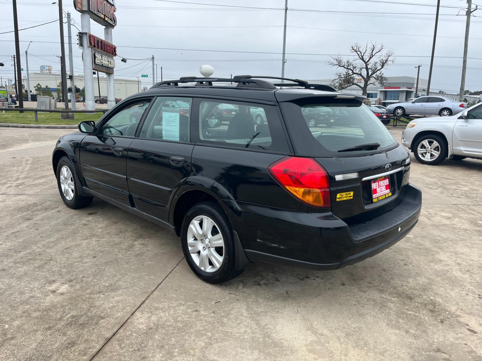 2005 Black Subaru Outback 2.5i Wagon (4S4BP61C757) with an 2.5L H4 SOHC 16V engine, 5-Speed Manual Overdrive transmission, located at 14700 Tomball Parkway 249, Houston, TX, 77086, (281) 444-2200, 29.928619, -95.504074 - Photo #4